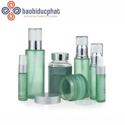 Bộ lọ đựng kem và sữa dưỡng thể thủy tinh màu xanh lá cây nhạt